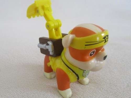 THREE CUTE SMALL HARD PLASTIC DOGS IN OUTFITS