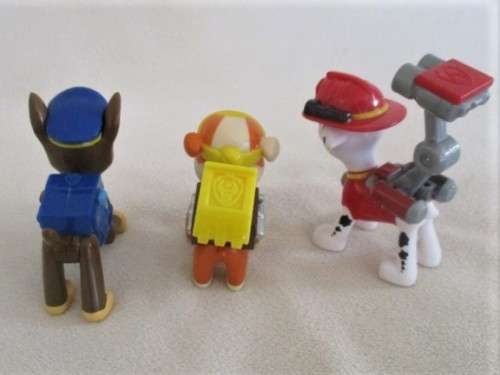 THREE CUTE SMALL HARD PLASTIC DOGS IN OUTFITS