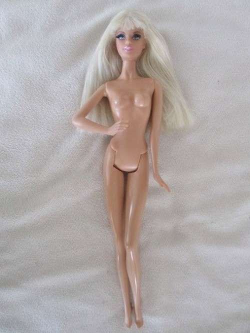 STUNNING MATTEL BARBIE DOLL WITH BANGS AND "REAL" LASHES IN THE CUTEST 1960's STYLE BELL BOTTOMS!