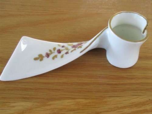 A SET OF SIX EXQUISITE LIMOGES, FRANCE CANDLE HOLDERS FOR THAT SPECIAL DINNER PARTY SETTING