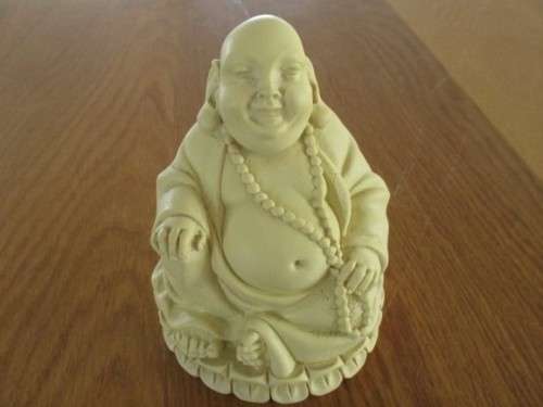 A NICE-SIZED, DETAILED BUDDHA FIGURINE