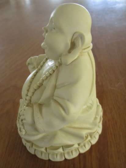 A NICE-SIZED, DETAILED BUDDHA FIGURINE