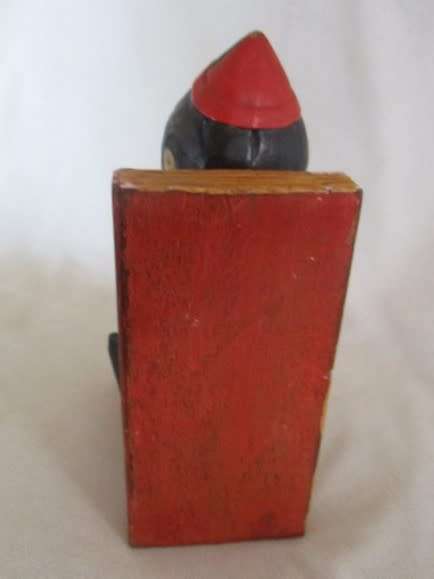 A VINTAGE WOODEN PINOCCHIO BOOK END