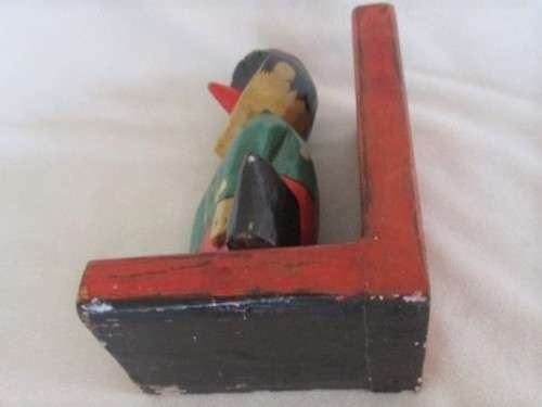 A VINTAGE WOODEN PINOCCHIO BOOK END