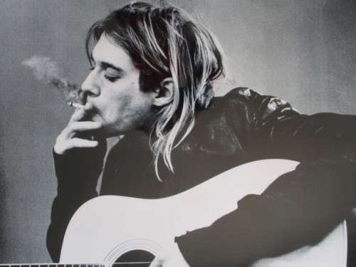 A LARGE LAMINATED ICONIC KURT COBAIN POSTER PUBLISHED IN 1994 SHORTLY AFTER HIS DEATH