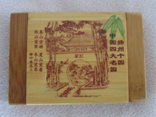 A MOST UNUSUAL VINTAGE BAMBOO WOOD COMPACT MIRROR AND COMB