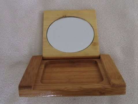 A MOST UNUSUAL VINTAGE BAMBOO WOOD COMPACT MIRROR AND COMB