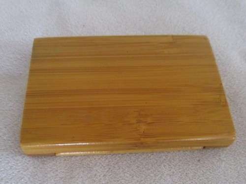 A MOST UNUSUAL VINTAGE BAMBOO WOOD COMPACT MIRROR AND COMB