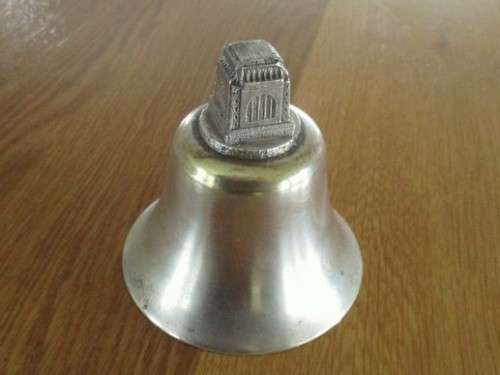 AN OLD BELL WITH DETAILED VOORTREKKER MONUMENT TO ADD TO YOUR AFRICANA COLLECTION