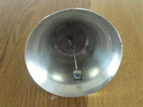 AN OLD BELL WITH DETAILED VOORTREKKER MONUMENT TO ADD TO YOUR AFRICANA COLLECTION