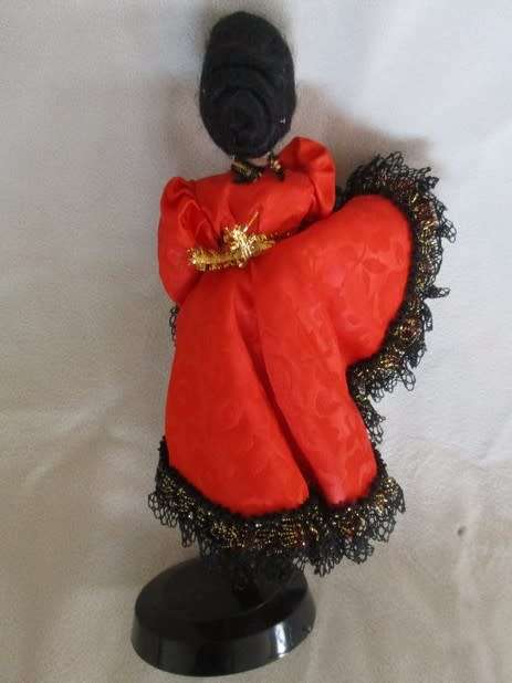 A PRETTY SMALL VINTAGE CAN-CAN DOLL ON STAND
