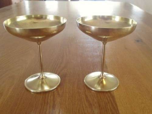 TWO BRASS CHAMPAGNE GOBLETS