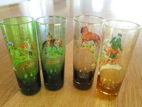 SET OF 4 VINTAGE SPANISH LONG SHOT GLASSES DEPICTING DIFFERENT HUNTING SCENES  FROM SA DA BANDEIRA