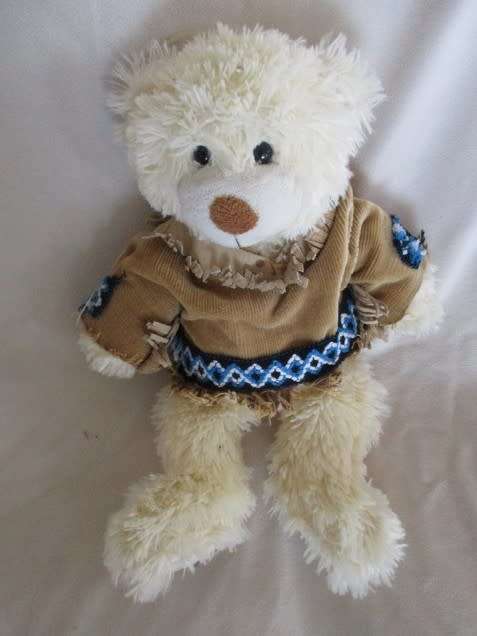 A CUDDLY 39CM TALL BEAR IN HER "COWGIRL" TOP (REMOVEABLE)