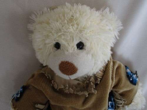 A CUDDLY 39CM TALL BEAR IN HER "COWGIRL" TOP (REMOVEABLE)