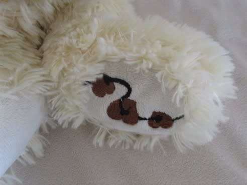 A CUDDLY 39CM TALL BEAR IN HER "COWGIRL" TOP (REMOVEABLE)
