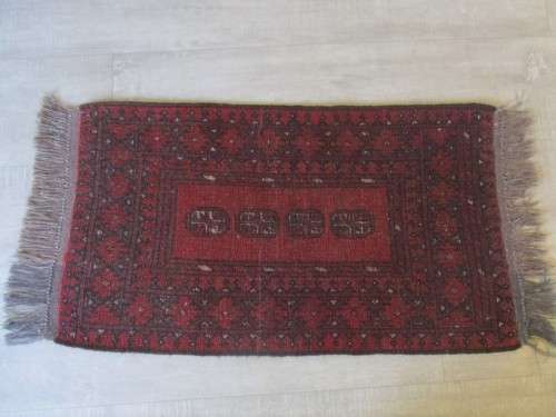 A HAND MADE AFGHAN CARPET/PRAYER MAT - 103CM X 48CM (1030MM X 480MM)