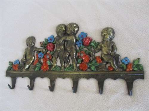 A VINTAGE ITALIAN MADE BRASS SIX HOOK WALL KEY/COAT/TOWEL/DISH CLOTH RACK WITH CUTE PLUMP CHERUBS