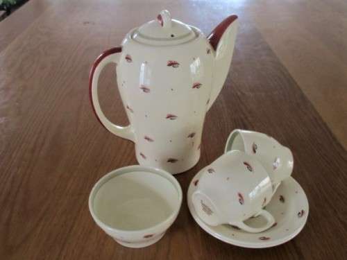 VINTAGE SUSIE COOPER COFFEE SET WITH UNUSUAL PATTERN (LOOKS LIKE EYE AND EYELASH) - CIRCA 1932-64