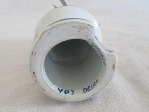 A LARGER SIZE (14CM TALL) VINTAGE HAND PAINTED DELFT WINDMILL WITH TURNING METAL BLADES