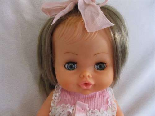 A LOVELY VINTAGE DOLL WITH THE SWEETEST FACE AND SEPARATE TOES!