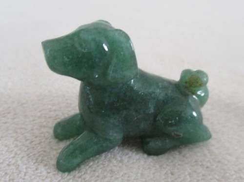 A TINY CHINESE JADE DOG