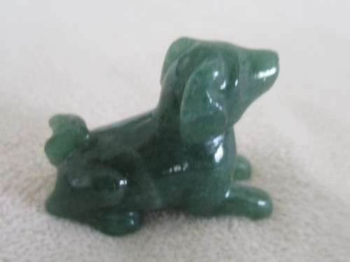 A TINY CHINESE JADE DOG