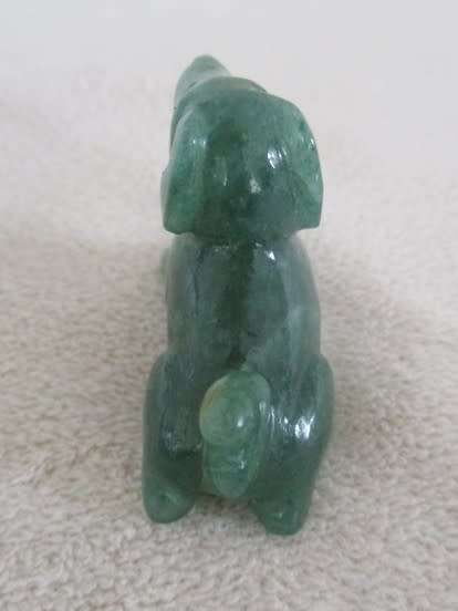 A TINY CHINESE JADE DOG