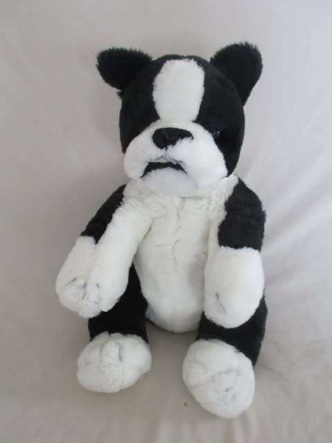 BARGAIN TIME!! A FLUFFY BLACK AND WHITE DOG - 40CM