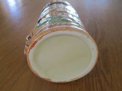 A HAND PAINTED GERMAN STEIN