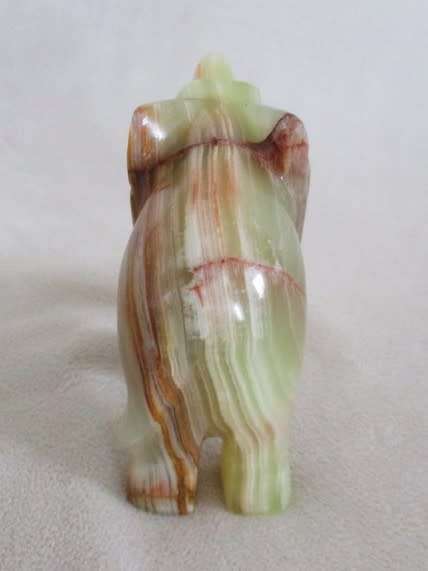 A BEAUTIFUL CARVED GREEN ONYX ELEPHANT