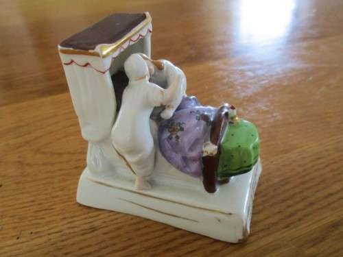 A VERY COLLECTABLE VICTORIAN FAIRING - LAST IN BED TO PUT OUT THE LIGHT (DAMAGE TO HAND)
