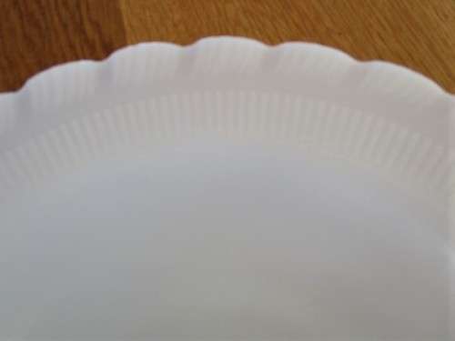 SIX VINTAGE MILK GLASS PLATES