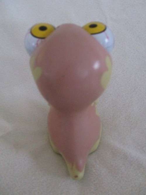APPARENTLY A `POPPIN PEEPER` STRESS RELIEF BALL - THE WEIRDEST CRAZY, GOOGLY-EYED DINOSAUR I`VE SEEN