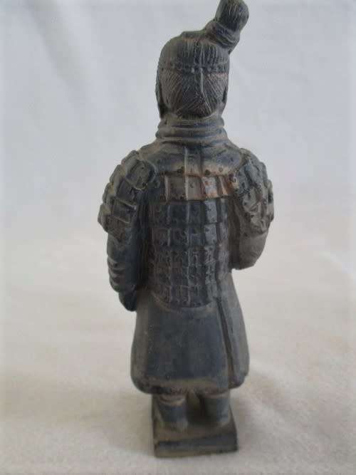 A SMALL CHINESE TERRACOTTA WARRIOR FIGURINE - SIGNED ON BASE