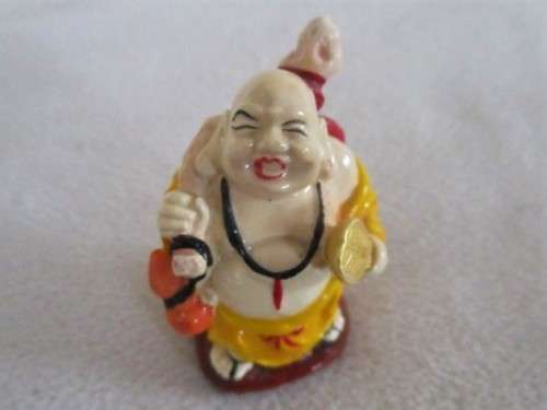 A SET OF SIX COLOURFUL AND JOLLY LITTLE BUDDHAS - THREE SITTING AND THREE STANDING