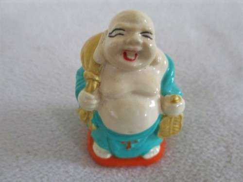 A SET OF SIX COLOURFUL AND JOLLY LITTLE BUDDHAS - THREE SITTING AND THREE STANDING