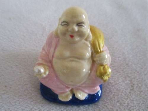 A SET OF SIX COLOURFUL AND JOLLY LITTLE BUDDHAS - THREE SITTING AND THREE STANDING
