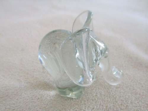A TINY NGWENYA GLASS ELEPHANT IN PERFECT CONDITION