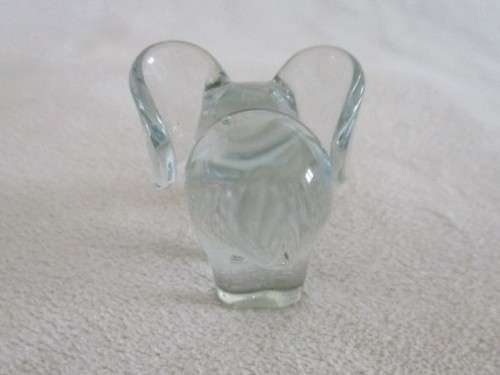 A TINY NGWENYA GLASS ELEPHANT IN PERFECT CONDITION