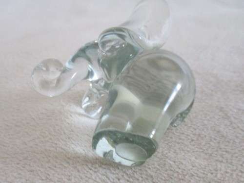 A TINY NGWENYA GLASS ELEPHANT IN PERFECT CONDITION