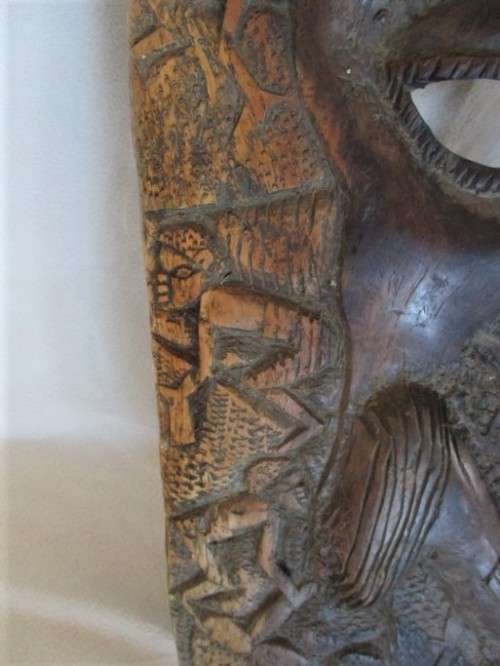AN UNUSUAL VERY LARGE INTRICATELY CARVED WOODEN AFRICAN MASK