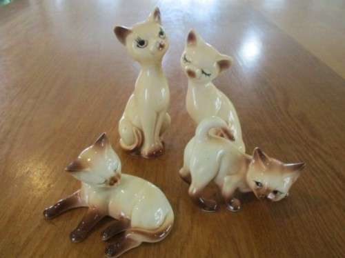 FOUR VERY CUTE PORCELAIN SIAMESE CATS