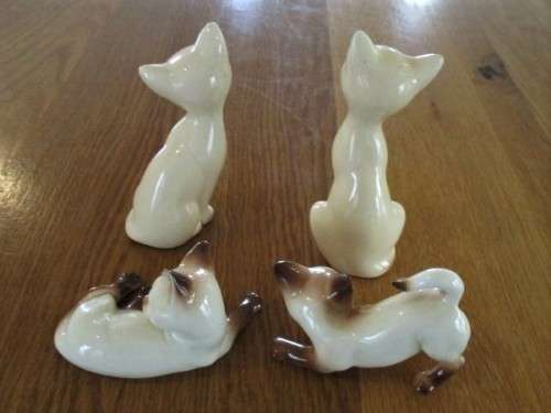FOUR VERY CUTE PORCELAIN SIAMESE CATS