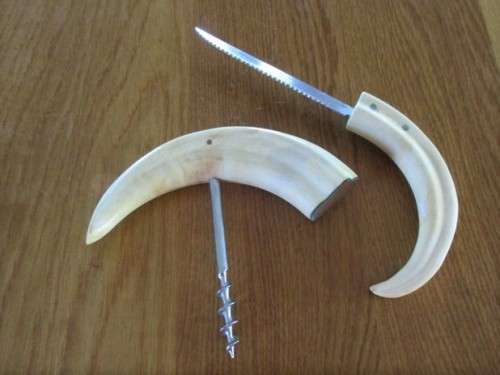 GOOD QUALITY JAPANESE STAINLESS STEEL KNIFE AND A CORKSCREW MADE FROM WARTHOG TUSKS