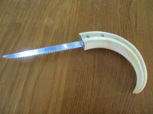 GOOD QUALITY JAPANESE STAINLESS STEEL KNIFE AND A CORKSCREW MADE FROM WARTHOG TUSKS