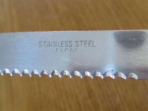 GOOD QUALITY JAPANESE STAINLESS STEEL KNIFE AND A CORKSCREW MADE FROM WARTHOG TUSKS