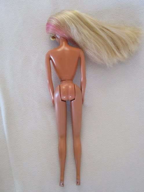 MATTEL BARBIE DOLL WEARING ORIGINAL EARRINGS AND WITH PINK HIGHLIGHTS AND TINSEL IN HER HAIR
