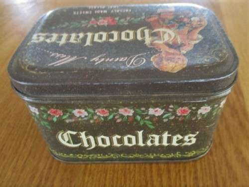A VINTAGE "DAINTY MISS CHOCOLATES" TIN FILLED WITH OVER A HUNRED OLD 1/2 CENT COINS (LARGER SIZE)