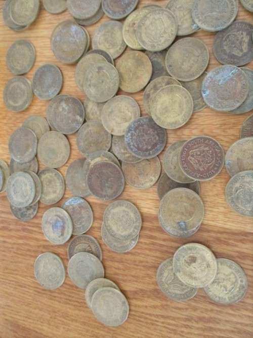 A VINTAGE "DAINTY MISS CHOCOLATES" TIN FILLED WITH OVER A HUNRED OLD 1/2 CENT COINS (LARGER SIZE)